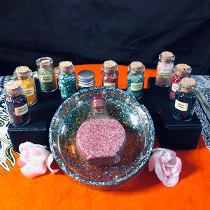 Collection of 11 small bottles of Gemstone chips and a Decorative Ashtray.